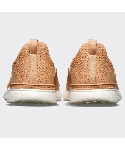 APL: Athletic Propulsion Labs Women's Techloom Bliss Sneakers, Tan/Ivory, 9.5 $101.25 Athletic Shoes